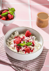 cottage cheese with raspberries and almond petals