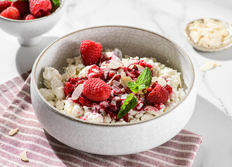 cottage cheese with raspberries and almond petals