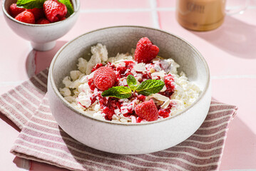 cottage cheese with raspberries and almond petals
