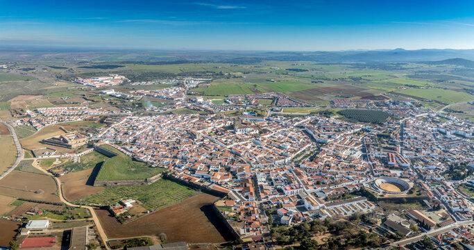 Aerial view of Olivenza's fortifications, a blend of Portuguese and Spanish styles, feature robust walls, imposing gates, and a formidable castle