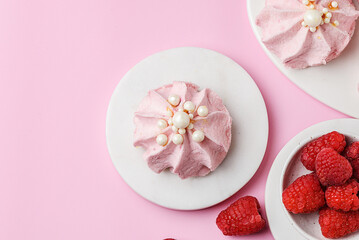 berry marshmallows on a pink background