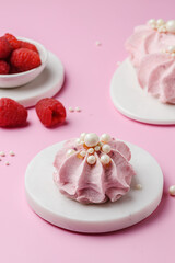 berry marshmallows on a pink background