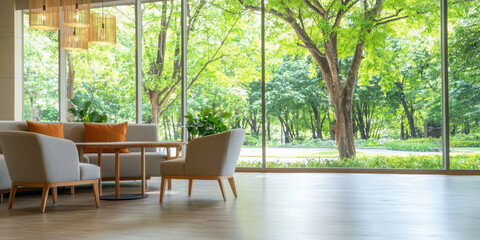 Fototapeta premium bright, spacious lounge area with modern furniture and large windows showcasing greenery
