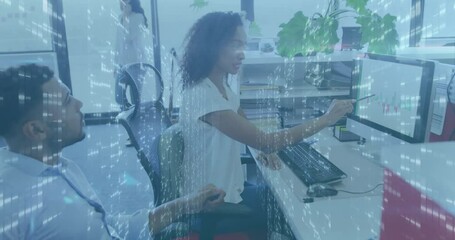 Analyzing data on computer screens, business professionals in office with digital overlay