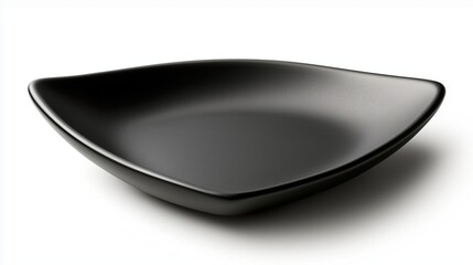 Stylish empty black triangular plate top view, on a white background, isolated