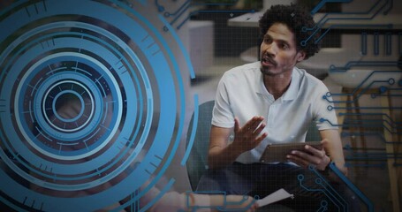 Holding tablet with digital code and animation overlay in school environment - Powered by Adobe