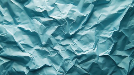Obraz premium High-res image of crumpled light blue paper. Ideal background for design projects needing a textured, abstract feel.