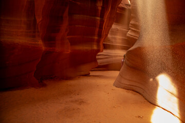 Experience the breathtaking beauty of Antelope Canyon with its stunning light beams illuminating the space, and the naturally sculpted sandstone walls that create a unique and aweinspiring landscape
