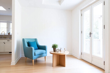 a blue chair sitting in front of a window