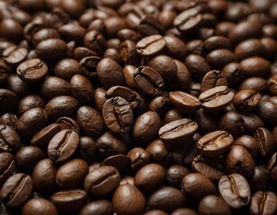 Fototapeta premium Scattered coffee beans on a neutral surface. Warm lighting enhances texture and rich brown tones, creating a cozy and inviting aesthetic.