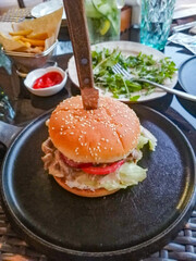 burger and drink on the table