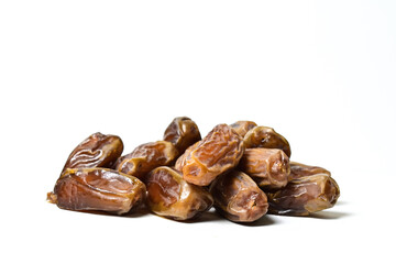 Side view of kurma tunisia or sweet dried dates palm fruits. Dates fruit isolated on white background. Clipping path. Close up.