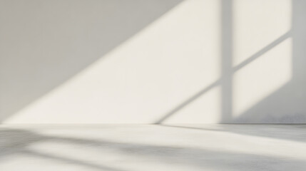 A photorealistic business card mockup stands alone on a textured concrete floor. The light gray wall in the background is softly illuminated, casting gentle shadows. The minimalist scene emphasizes