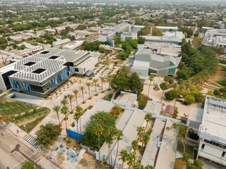 Aerial view of Santa Monica College in California, USA. The photo shows the campus buildings, palm...