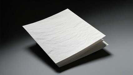 a high-resolution top view photo of a clean white paper sheet with subtle texture details, placed on a deep gray background. the paper has a slightly rough surface, showing fine fibers and a natural o