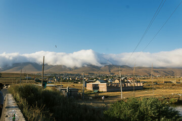 landscape with clouds over mountains