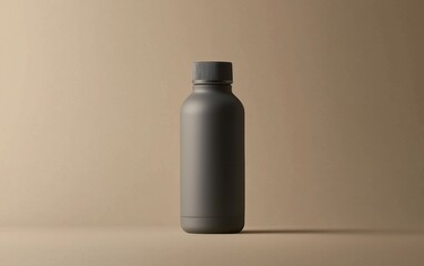 Simple gray bottle on a neutral backdrop highlighting minimalist design and color in an artistic arrangement