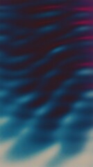 Fototapeta premium Blurry abstract image displays dark blue colors with a subtle red