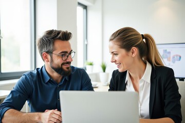 Professional Young Caucasian Man and Woman Engaging in Collaborative Discussion Over a Laptop in a Bright Modern Office Environment with Natural Lighting