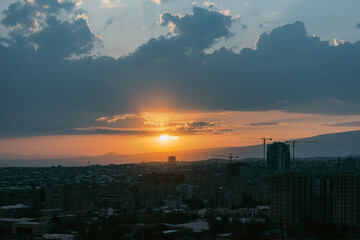 Obraz premium sunset over the city