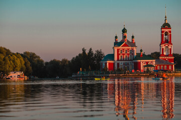 The Golden Ring of Russia, the city of Pereslavl-Zalessky. The Church of the Forty Martyrs of Sebaste at a beautiful pink sunset on the side of Lake Pleshcheyev.