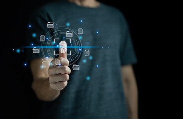 Cyber security concept. Man using thumb to scan finger print or for digital processing biometric identification to access security system includes internet banking, cloud system and mobile phone ,