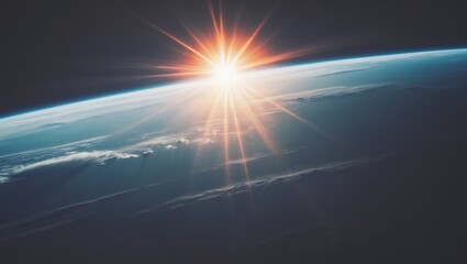 The earth seen from space with bright sun shining brightly.