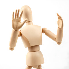 Wooden mannequin with hands up, isolated on white background