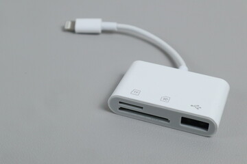 Kudus, 13 Maret 2025 - SD Card Camera Reader Adapter,Flashdisk to Apple iphone . isolated on white background.