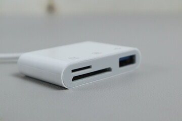 Kudus, 13 Maret 2025 - SD Card Camera Reader Adapter,Flashdisk to Apple iphone . isolated on white background.