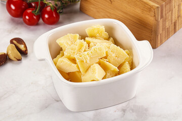 Crushed parmesan cheese in the bowl