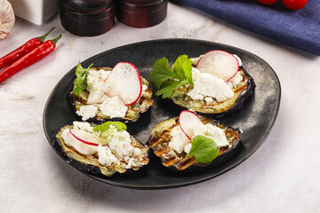 Grilled eggplant with cheese and radish