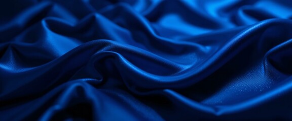 Fototapeta premium Blue Wavy Silk Background.