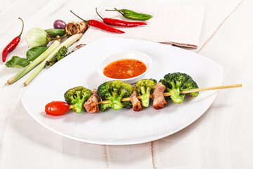 Thai Street foof satay with bacon and broccoli