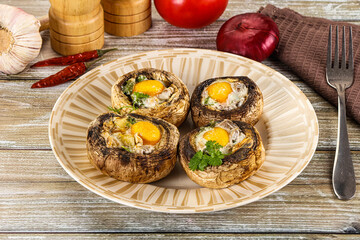 Baked champignon with quail egg