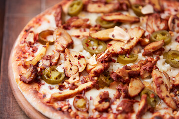 Gyros Pizza with jalapeno pepper and mozzarella cheese. Soft focus. Close up.