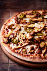 Gyros Pizza with jalapeno pepper and mozzarella cheese. Soft focus. Close up.