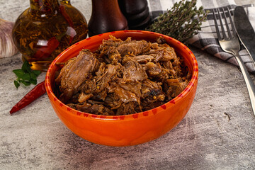 Shredded slow cooked pork meat