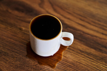 cup of coffee on wooden table