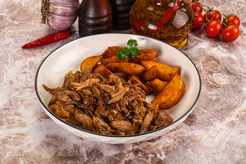 Baked shredded pork with potato