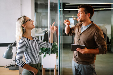 Programmers cooperating at IT company developing apps. People business work office concept