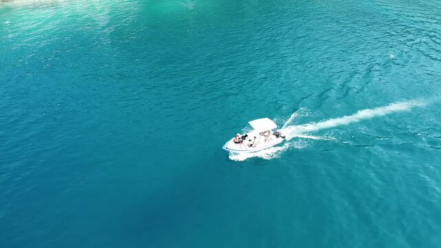 Aerial video over boats and coastline on Potos Island Greece