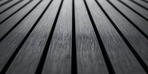 A close-up view of dark wooden planks arranged in parallel lines, showcasing their texture and grain.