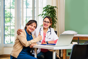 Indian doctor and elderly patient share a warm handshake, celebrating healthcare and recovery