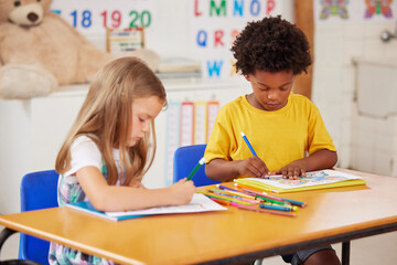 School, children and coloring on paper in classroom for creative activity, learning development or...