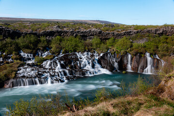 Fototapeta premium long exposure shot of wide Hraunfossar waterfall, Iceland