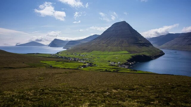 Time lapse Panorama outdoor landscape mountain scene of Vidoy island. Summer view of Faroe Islands