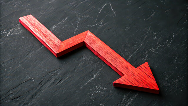 A red wooden arrow pointing downwards on a black background symbolizes a recession and crisis in the economy. It represents a decline in financial performance, losses and market instability.
