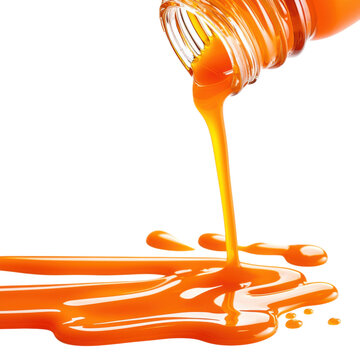 isolated transparent Background. Pouring orange liquid from bottle, creating vibrant stream and puddle