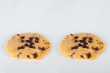 Chocolate chip cookies isolated on whiye background. Sweet biscuits.